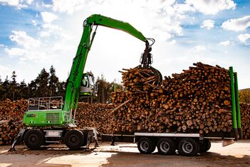 SENNEBOGEN material handler 830 mobile trailer timber handling saw mill log yard timber grab