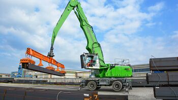 Steel logistics with SENNEBOGEN 865 E Hybrid, material handler with a magnetic lifting beam material handler with magnetic lifting beam