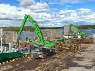 SENNEBOGEN material handler timber handler 875 E timber handling ship loading port handling