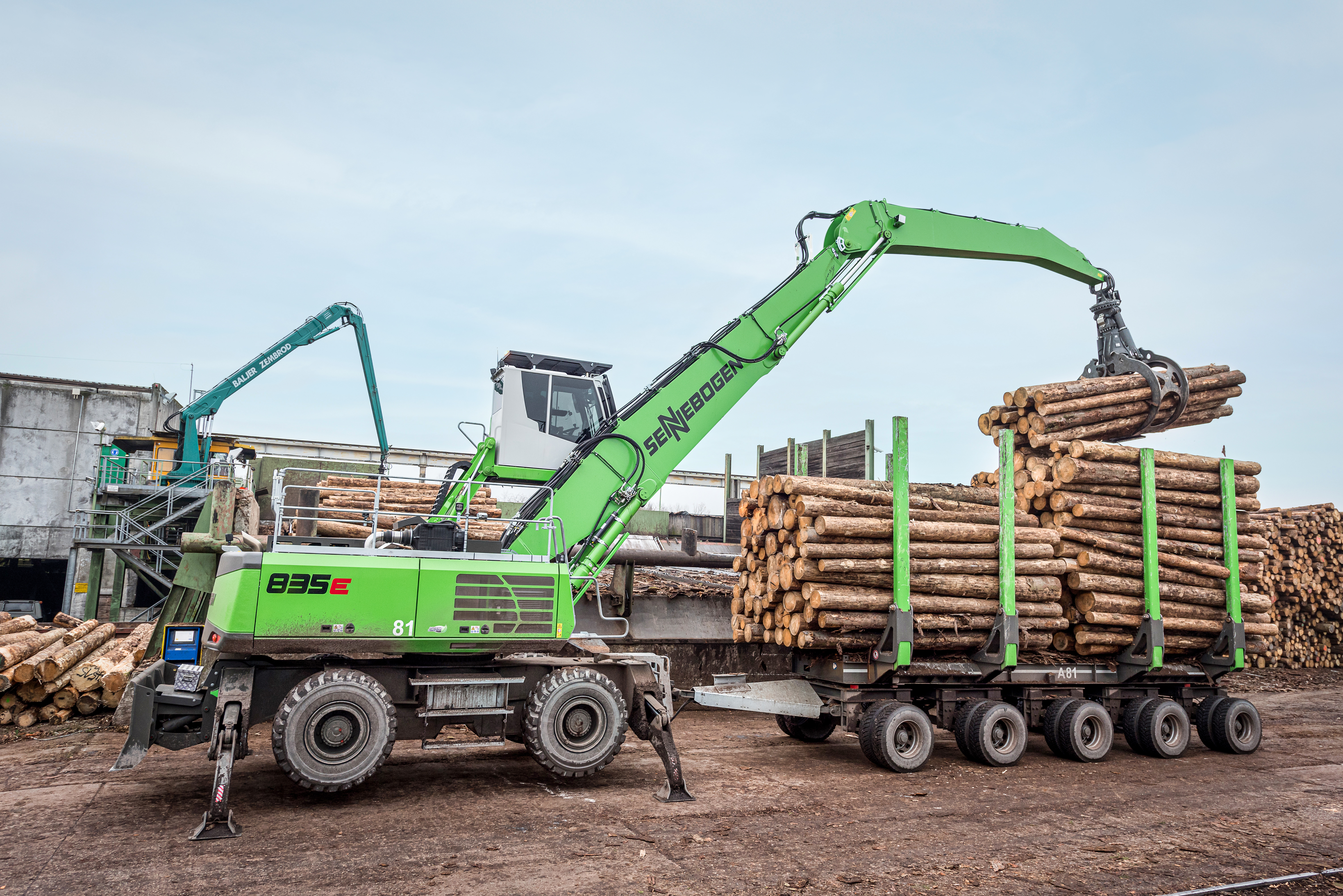 Investment For A Green Future Timber Log Logistics With Sennebogen 835 E Material Handler And Trailer Sennebogen Maschinenfabrik Gmbh