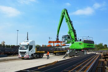 Steel logistics with SENNEBOGEN 865 E Hybrid, material handler with a magnetic lifting beam material handler with magnetic lifting beam