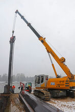  SENNEBOGEN Telekran 643 E and 835 E handling excavator at DOMARIN hydraulic engineering works 