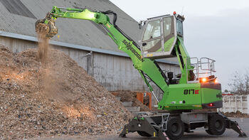 SENNEBOGEN 817 E material handler during recycling handling work