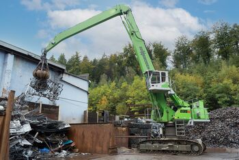 ELECTRIC MATERIAL HANDLER SENNEBOGEN 835 E in scrap recycling, shredding of industrial steel scrap 