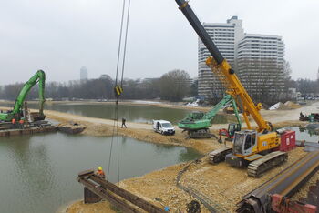  SENNEBOGEN Telekran 643 E and 835 E handling material handler at DOMARIN hydraulic engineering works 