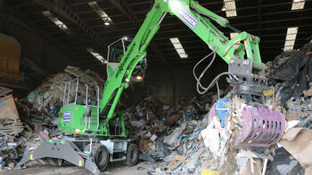 SENNEBOGEN 817 material handler during recycling handling work