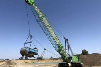 Seilbagger SENNEBOGEN 6140 HD bei der Kiesgewinnung in Ariège, Frankreich