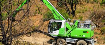 SENNEBOGEN 718 timber material handler, forest excavator for clearing up forest fires in California, USA