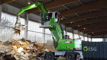 Two SENNEBOGEN 822 G material-handling excavators are being used for recycling operations at ESG for feeding, loading, and transferring materials.