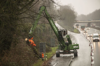 material handler SENNEBOGEN 830 demolition, tree felling machine, care of trees and greenery along traffic routes