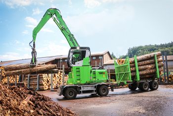SENNEBOGEN 730 timber handling machine in Pick & Carry application with trailer, saw mill, Switzerland SENNEBOGEN 730 timber handling machine in Pick & Carry application with trailer, saw mill, Switzerland