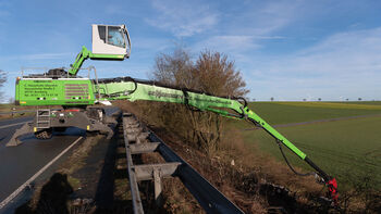 Embankment maintenance tree care with tree care handler machine SENNEBOGEN 728 E