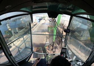 SENNEBOGEN largest material handler in the world 895 E Hybrid port handling Portcab interior view cab