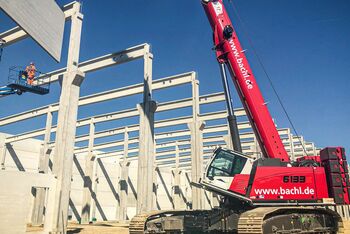 130 t telescopic crawler crane SENNEBOGEN 6133, assembly of steel and prestressed concrete prefabricated parts, hall construction