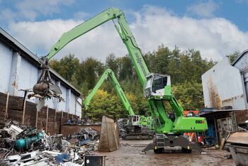 ELECTRIC MATERIAL HANDLER SENNEBOGEN 835 E in scrap recycling, shredding of industrial steel scrap 