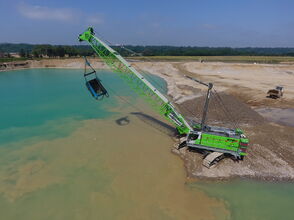 SENNEBOGEN 6140 HD rope excavator at gravel extraction in Ariège, France