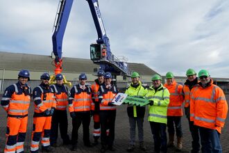 SENNEBOGEN 875 Excavator in port handling in England 