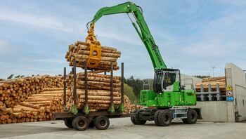  SENNEBOGEN material handler in saw mill, log transport, timber handling with timber grab