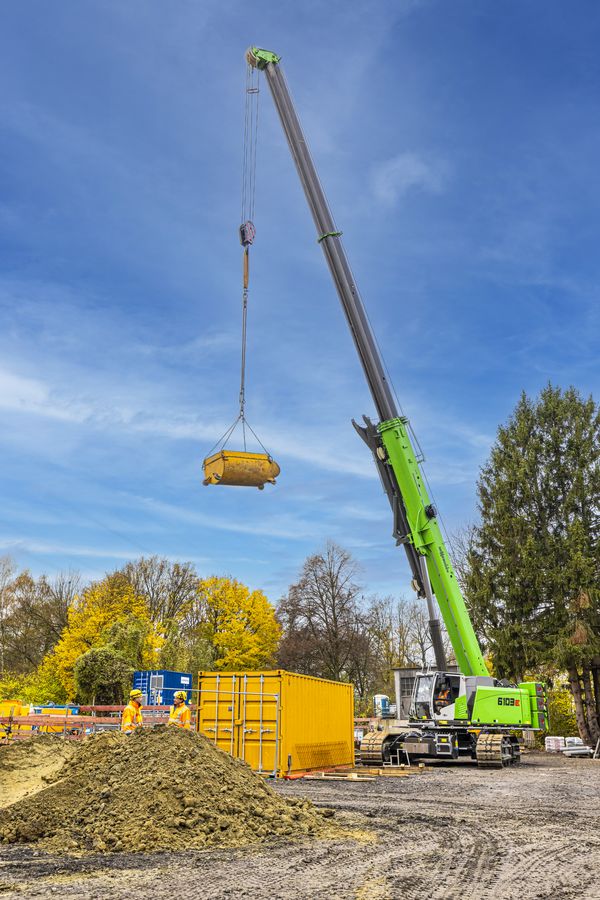 sewer construction with 100 t telescopic crawler crane, SENNEBOGEN 6103, lifting works sewer construction with 100 t telescopic crawler crane, SENNEBOGEN 6103, lifting works