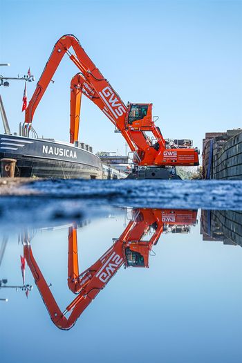ship unloading SENNEBOGEN 835 material handler Belgium, cargo handling ship unloading SENNEBOGEN 835 material handler Belgium, cargo handling