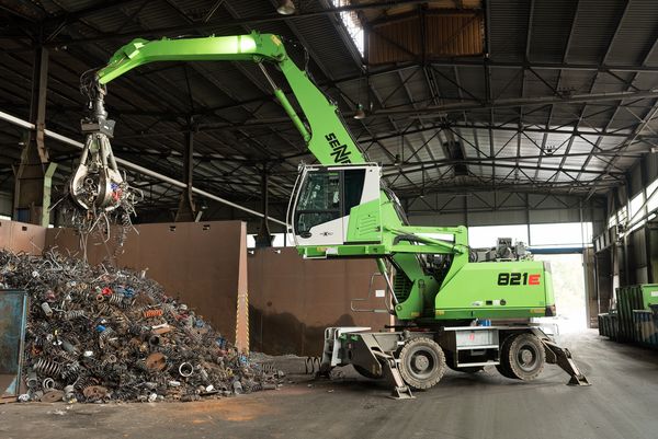 SENNEBOGEN material handler 821 E scrap handling waste management orange peel grab