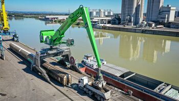 largest material handler in the world, SENNEBOGEN 895 with electric engine and rail gantry, 35 m reach, Ennshafen Austria