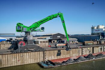 largest material handler in the world, SENNEBOGEN 895 with electric engine and rail gantry, 35 m reach, Ennshafen Austria