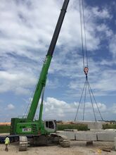 Telescopic crane SENNEBOGEN 6113 E during airport construction in Singapore