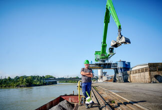 largest material handler in the world, SENNEBOGEN 895 with electric engine and rail gantry, 35 m reach, Ennshafen Austria