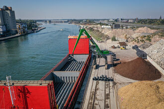  Port material handling with SENNEBOGEN 870 crawler gantry , unloading of steel wire coils, loading of heavy cargo and bulk material