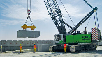 SENNEBOGEN 6130 builds Dock Wall for port extension