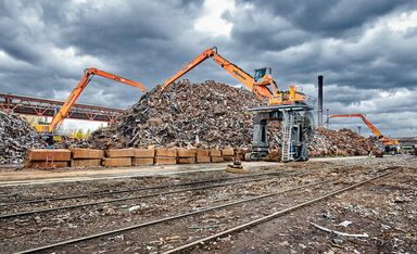 SENNEBOGEN material handler electric 840 crawler scrap handling orange peel grab