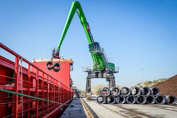 Port material handling with SENNEBOGEN 870 crawler gantry , unloading of steel wire coils, loading of heavy cargo and bulk material