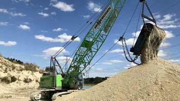 40 t duty cycle crawler crane SENNEBOGEN 640 with dragline, extraction of sand and gravel, France