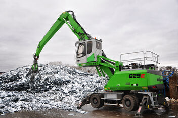 SENNEBOGEN material handler 825 E mobile scrap handling orange peel grab