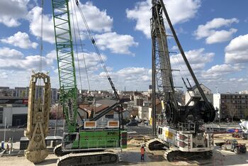 SENNEBOGEN 6140 HD rope excavator and 7700 R-SL crawler crane used in building construction / civil engineering for Grand Paris Express in France