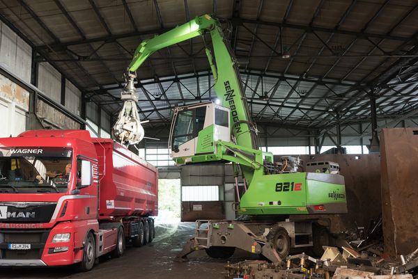 SENNEBOGEN material handler 821 E scrap handling waste management orange peel grab