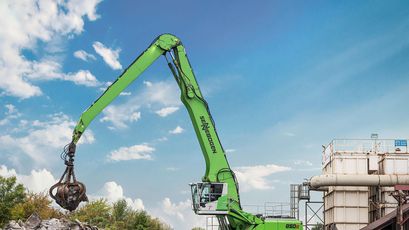 Material handler SENNEBOGEN 850 E scrap handling 62 t material handler SENNEBOGEN 850 E mobile undercarriage scrap handling with orange peel grab