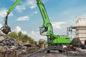 62 t material handler SENNEBOGEN 850 E mobile undercarriage scrap handling with orange peel grab