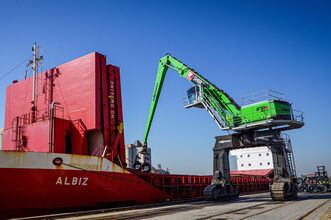 Port material handling with SENNEBOGEN 870 crawler gantry , unloading of steel wire coils, loading of heavy cargo and bulk material