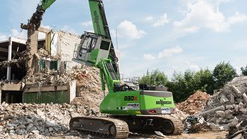 Demolition handler SENNEBOGEN 830 E demolishes furniture store in Regensburg