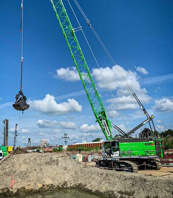 SENNEBOGEN 100 t duty cycle crane in clamshell grab operation on the prestigious project "New 5th lock chamber at Brunsbüttel" 