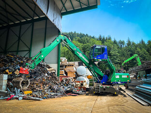 Umschlagbagger Umschlagmaschine SENNEBOGEN 825 E Schrottumschlag Recycling Abfallwirtschaft Recyclingbetrieb Sortiergreifer Schnellwechsler