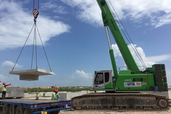  Telescopic crane SENNEBOGEN 6113 E during airport construction in Singapore 