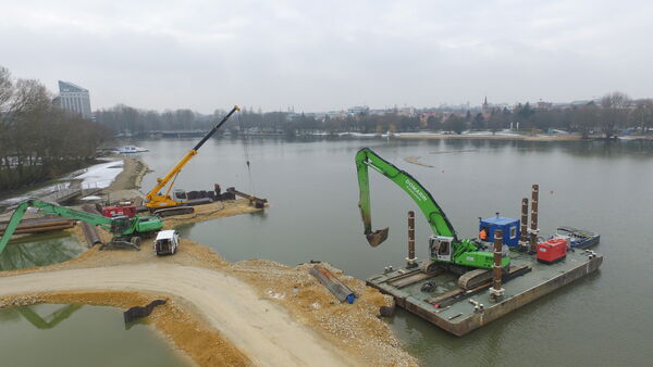  SENNEBOGEN Telekran 643 E and 835 E handling excavator at DOMARIN hydraulic engineering works 