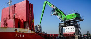 Port material handling with SENNEBOGEN 870 crawler gantry , unloading of steel wire coils, loading of heavy cargo and bulk material