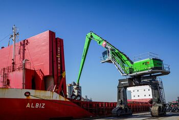 Port material handling with SENNEBOGEN 870 crawler gantry , unloading of steel wire coils, loading of heavy cargo and bulk material
