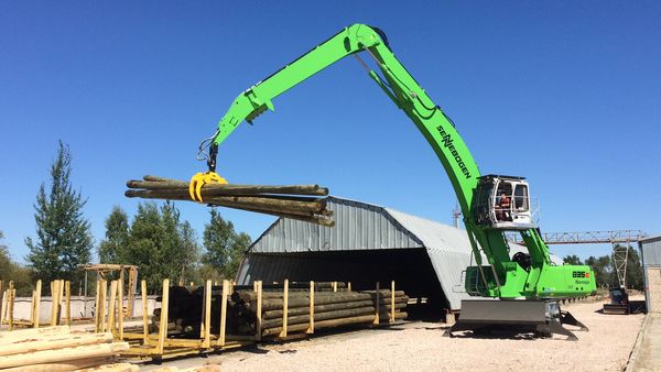 SENNEBOGEN 835 dredger handling wood in Latvia